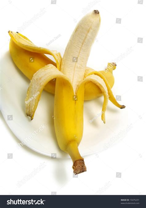 A Peeled And An Unpeeled Fresh Banana On White Plate And Isolated On ...