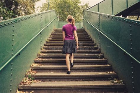 Young Woman Walking Up Stairs Stock Image Image Of Lifestyle People