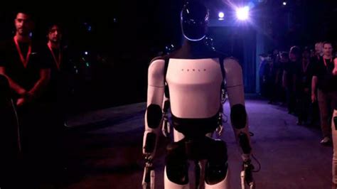 Watch Tesla Humanoid Robot Optimus Interaction With Humans Wanting To