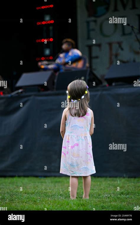 Young Girl Watching Singer Songwriter Crys Matthews Performing On