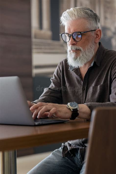 An Incredibly Beautiful And Stylish Gray Haired Man Of Fifty Years Old