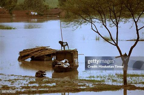 Breach In Ghaghra Embankment Floods Villages In Gonda Photos and Premium High Res Pictures ...