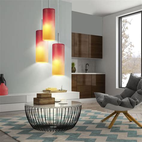 a living room filled with furniture and large windows