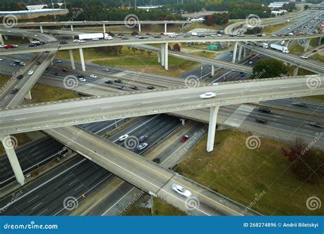 American Freeway Intersection With Fast Driving Cars And Trucks View