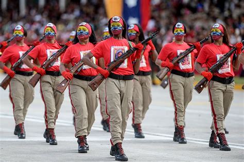 Venezuelan Female Soldiers Participate In A Parade During The