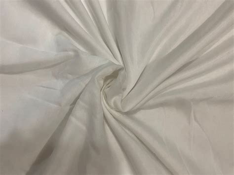 Plain Solids Polyester Killer Fabric White At Rs Meter In Surat