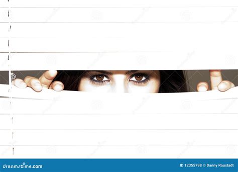 Young Brunette Woman Looking Through The Blinds Stock Photo Image Of