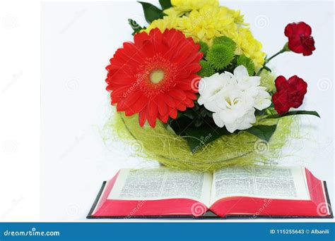 Open Bible, and Beautiful Flowers on White Background Stock Image ...