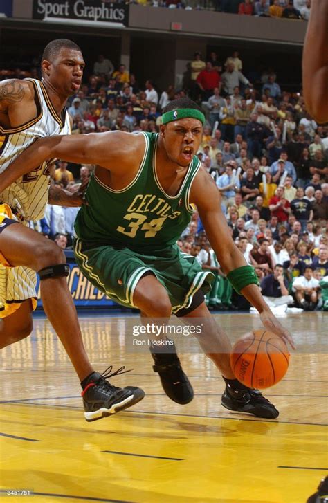 Paul Pierce Of The Boston Celtics Drives Past Jonathan Bender Of The