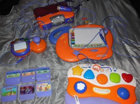 Vtech V.smile video game console with games, controllers + baby vsmil for Sale in McDonough ...