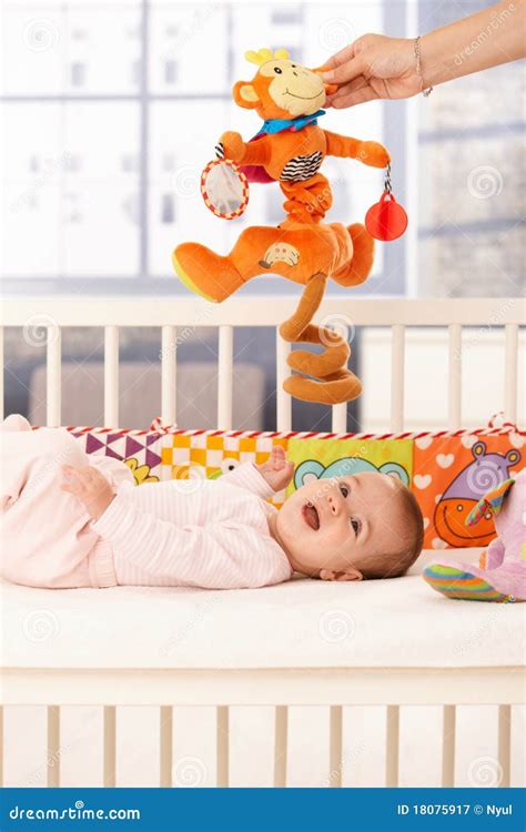 Happy baby with toy stock image. Image of girl, colorful - 18075917
