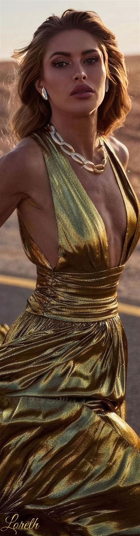 A Woman In A Gold Dress Standing On The Road