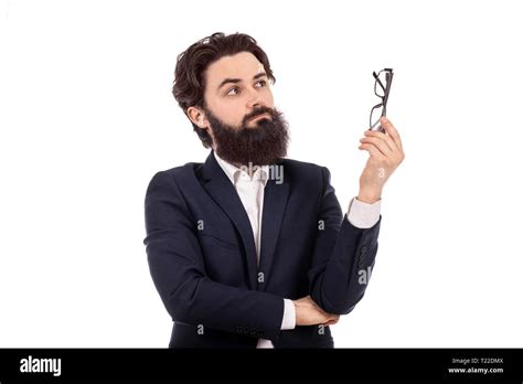 Bearded Man With Glasses For Sight In Hand Image On A Blue Background