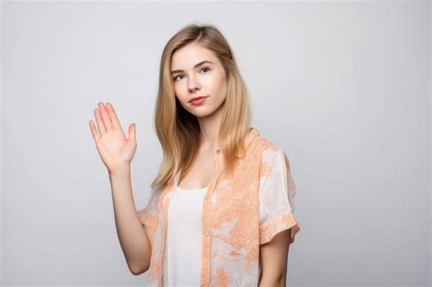 Premium Ai Image Studio Shot Of A Young Woman Holding Out Her Hand To