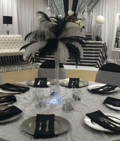 The Feathered Black And White Centerpiece At This Party Is Fabulous