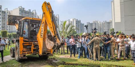 Noida Bulldozer Action On House Of Absconding Bjp Leader Who Abused