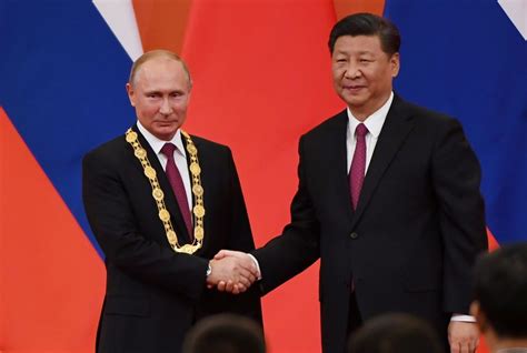 Xi Jingping Praises Relationship With Russia Awards Putin With