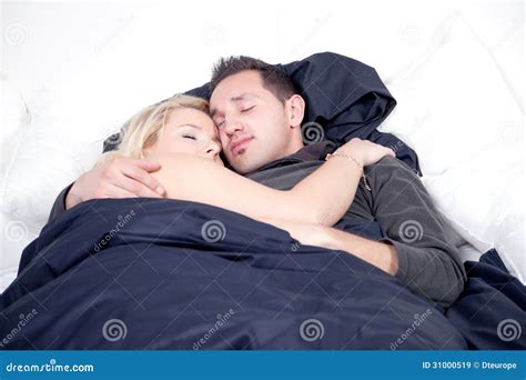 Young Couple Sleeping Peacefully In Bed Royalty Free Stock Images