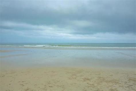 Rainy Beach Stock Photos, Images and Backgrounds for Free Download