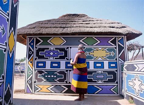 Ndebele Woman Painting Her House. South Africa. | Stocksy United