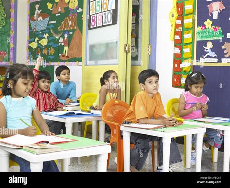 South Asian Indian Boys And Girls Studying In Nursery School Mr Stock