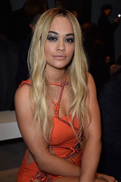 Busty Rita Ora Braless And Pantyless In Tiny Orange Dress Porn Pictures