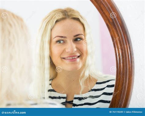 Cute Girl Watching Herself In Mirror Indoors Stock Image Image Of