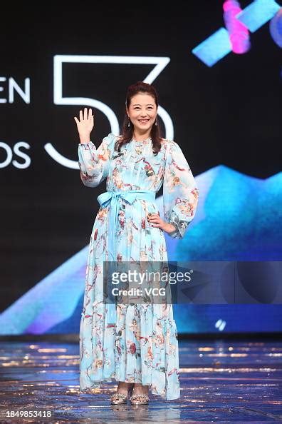 Actress Kathy Chow Hoi Mei Poses On The Stage During The 53rd Golden