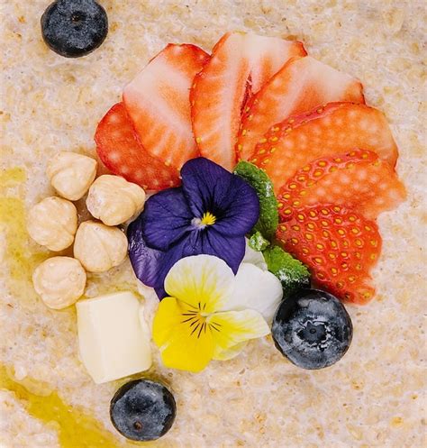 Premium Photo Oatmeal Porridge With Blueberries Strawberries And