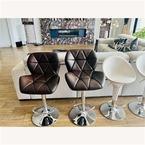 Contemporary Leather Swivel Bar Stools - AptDeco