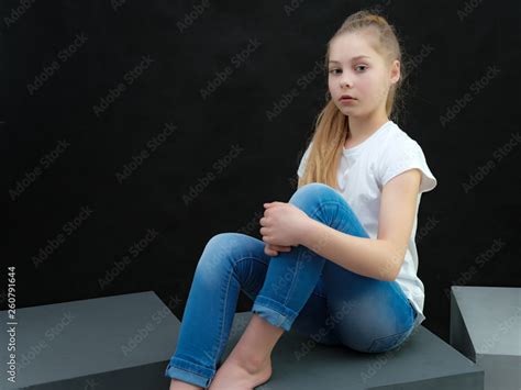 A Concept Portrait Of A Cute Pretty Blonde Teen Girl With Long Hair