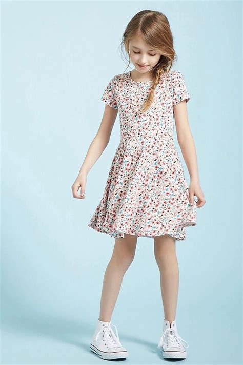 Forever 21 Girls A Stretch Knit Skater Dress Featuring An Allover Floral Print A Round