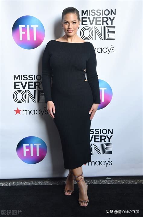 Ashley Graham Wears A Black Long Sleeved Dress Strappy Sandals Inews