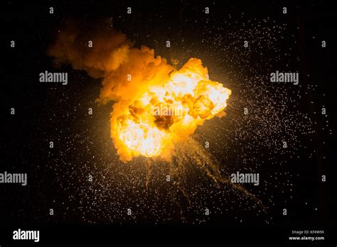 Realistic Fiery Explosion With Sparks Over A Black Background Fireball