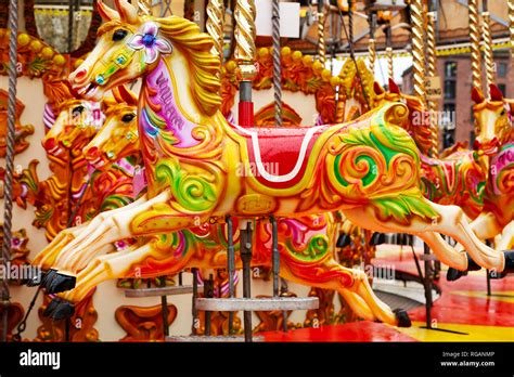 A Brightly Painted Wooden Horse On A Carousel Carousels Are Often