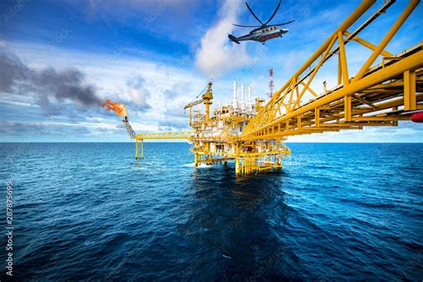 Offshore Oil And Gas Rig Platform With Offshore Helicopter Transporting