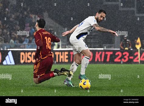 Hakan Calhanoglu Of FC Internazionale And Leandro Paredes Of AS Roma