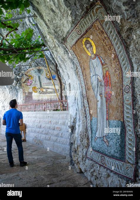 A Pilgrim By The Saint Basil Of Ostrog Mosaic At The Ostrog Monastery