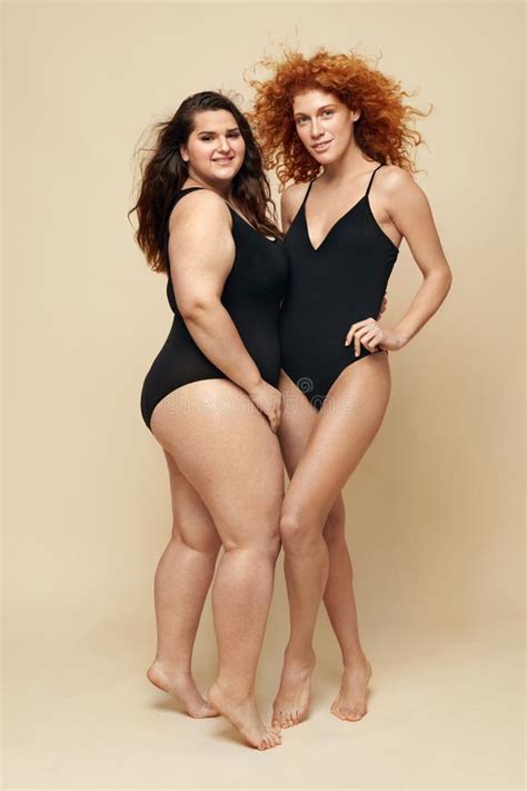 Plus Size Model Fat Woman In Black Bodysuit Portrait Crawling Brunette Posing On Beige