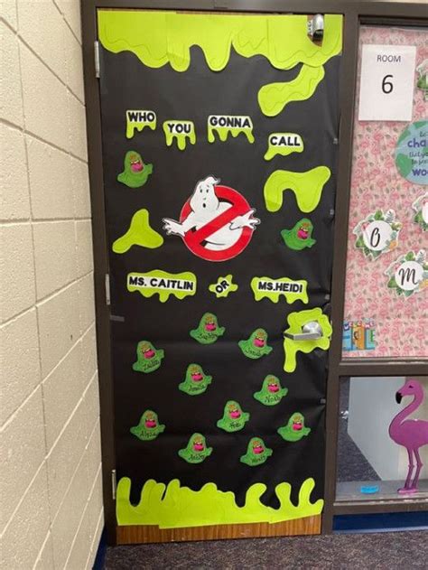 A Classroom Door Decorated With Halloween Decorations