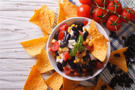 Mexican Salsa With Beans And Corn Chips Nachos Horizontal Top Stock