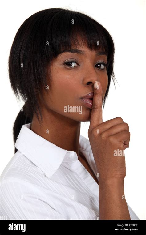 Woman Making Shush Gesture Stock Photo Alamy