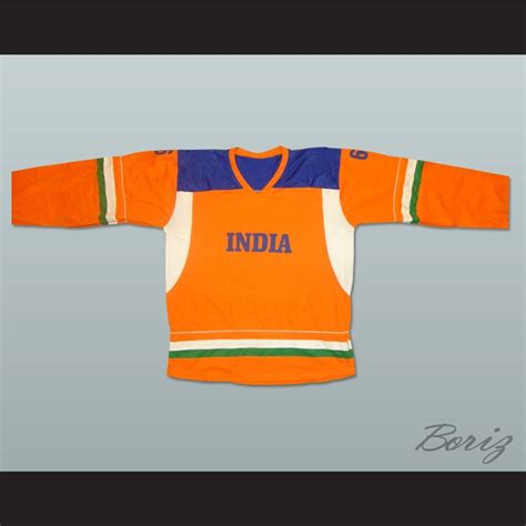 An Orange And Blue Hockey Jersey With The Word India On It In Front Of
