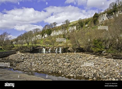 View Of River With Waterfalls And Limestone Cliffs Wainwath Force And