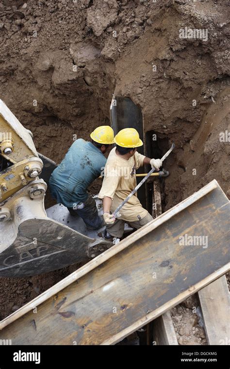 construction workers digging  foundation  res stock photography