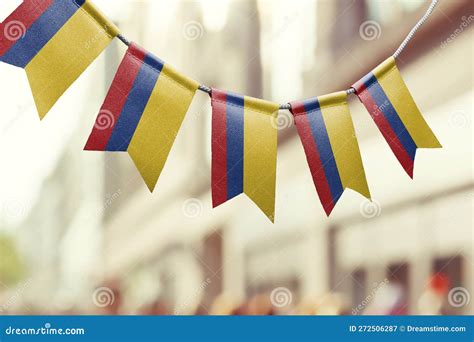 A Garland Of Colombia National Flags On An Abstract Blurred Background