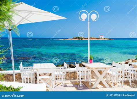 Cafe On The Beach Tables Wooden Chairs Royalty Free Stock Photo