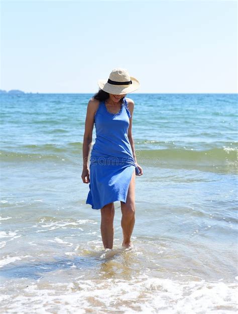 45 Years Old Russian Woman In Swimsuit Laughing And Standing In