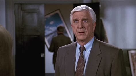 Paramount Rebooting The Naked Gun Ed Helms Is The New Leslie Nielsen