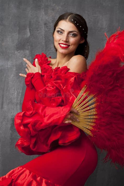 Woman Traditional Spanish Flamenco Dancer Dancing In A Red Dress Stock